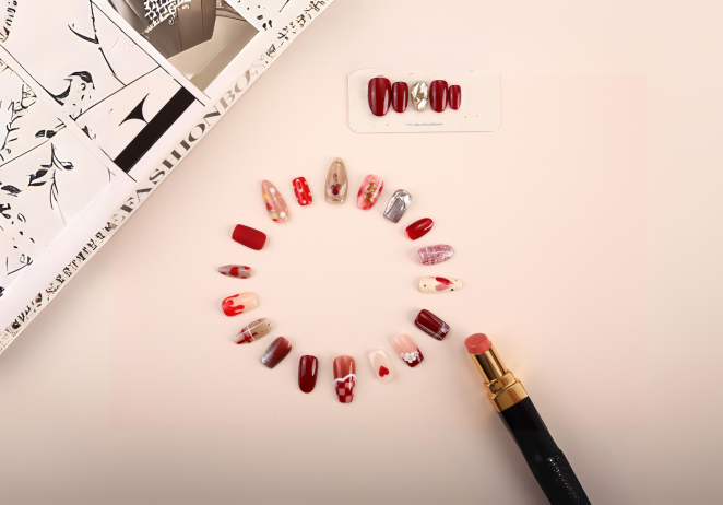 Circle of red and pink nail art designs with a lipstick tube